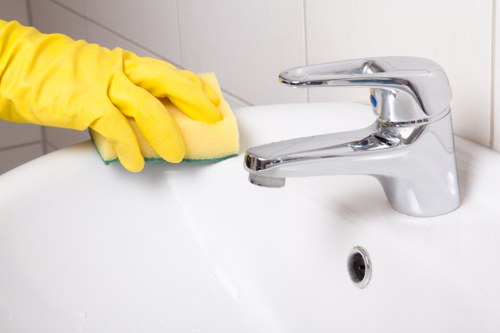 Local after builders cleaning service preparing a BR3 room for handover